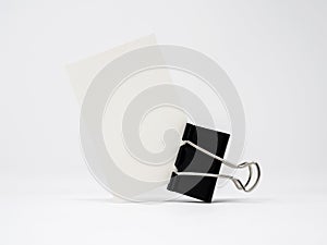 Blank business card held by binder clip