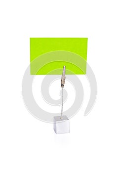 Blank business card in holder on white