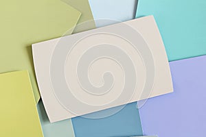 Blank business card mockup on Multicolor paper card palette Texture background