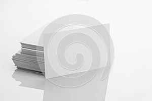 Blank Business Card Mockup on White Reflective Background