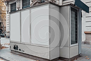 Blank canvas white outdoor banner at Newsstand with newspapers and magazines