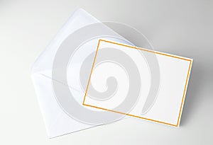 Blank card decorated with yellow frame and blue envelope