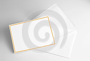 Blank card decorated with yellow frame and envelope