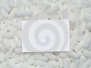 Blank card on packing peanuts