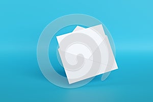 Blank card popping out of an envelope isolated on blue background. 3d illustration