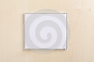 Blank CD back on wood
