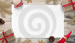Blank Christmas card mockup for greeting text. Piece of white paper surrounded with gifts and Christmas decorations