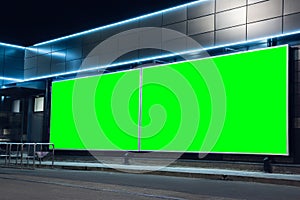 Blank citylight for advertising on the building at city night, copyspace for your text, image, design