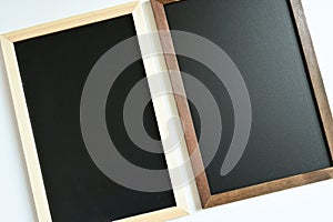 blank clean new chalkboard in wooden frame isolated on white background