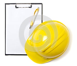 Blank clipboard paper and hard hat