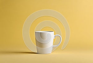Blank coffee cup on the table. Isolated on yellow background, v16