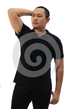 Blank collared shirt mock up template, front view, Asian male model wearing plain black t-shirt isolated on white. Polo tee design