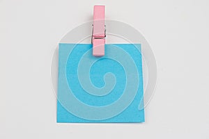 Blank colored sticky notes with clips. Office accessories for listing and memorizing on the table.