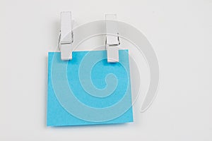 Blank colored sticky notes with clips. Office accessories for listing and memorizing on the table.