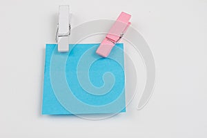 Blank colored sticky notes with clips. Office accessories for listing and memorizing on the table.