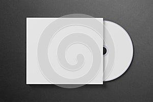 Blank compact disk cover on dark