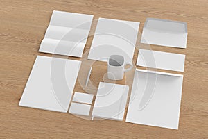 Blank corporate stationery set mockup with envelopes, business cards, folder, trifold brochure, paper sheet, notebook, cup and