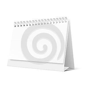 Blank desktop calendar isolated on white background. Blank desktop spiral calendar. Realistic white blank standing desk