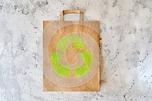 Blank eco brown paper bag on light background. Mock up