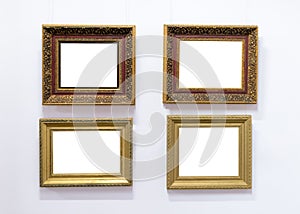 Blank empty frames hanging on museum wall. Art gallery, museum exhibition white clipping path