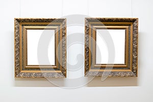 Blank empty frames hanging on museum wall. Art gallery, museum exhibition white clipping path