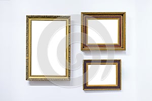 Blank empty frames hanging on museum wall. Art gallery, museum exhibition white clipping path