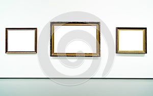 Blank empty golden frame on white background. Art gallery, museum exhibition white clipping path