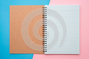 Blank empty notepad on pink blue background - Business education stationery