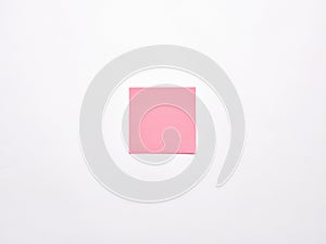 Blank or empty pink notepaper or notepad on white background