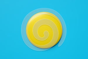 Blank or empty round yellow button or badge on blue background