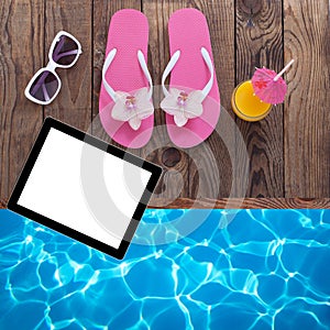 Blank empty tablet computer, summer accessories on