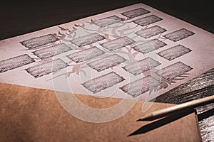 Blank family tree, notebook and pencil on table