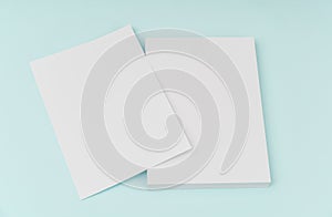 Blank flyer poster, brochure mockup,A4, US-Letter, on blue background .