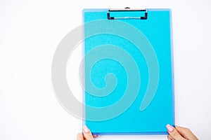 Blank Folder with Blue Paper. Hand that Holding Folder and Pen o