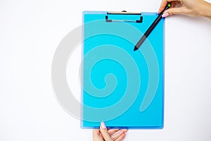 Blank Folder with Blue Paper. Hand that Holding Folder and Pen o