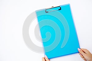 Blank Folder with Blue Paper. Hand that Holding Folder and Pen o