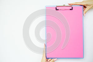 Blank Folder with Pink Paper. Hand that Holding Folder and Handle on White Background. Copyspace. Place for Text