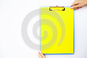 Blank Folder with Yellow Paper. Hand that Holding Folder and Han