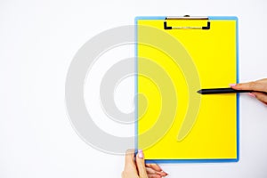 Blank Folder with Yellow Paper. Hand that Holding Folder and Han