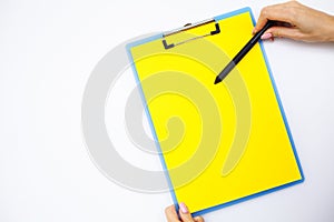 Blank Folder with Yellow Paper. Hand that Holding Folder and Han