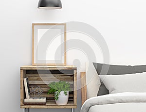 Blank frame mockup on bedroom side table