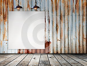 Blank frame on Rusted galvanized iron plate with wood floor