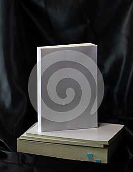 Blank front cover of paperback book or novel book in dark moody style in top view for cover mockup