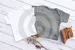 Gender neutral white and grey baby grow mockup photo
