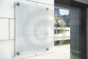 Blank glassy signboard on the wall outdoor