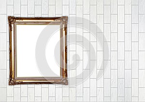 Blank golden frame on brick stone wall