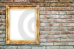 Blank golden frame on brick stone wall