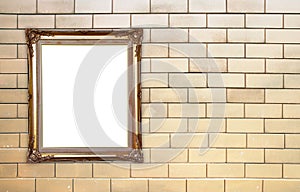 Blank golden frame on brick stone wall