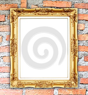 Blank golden frame on brick stone wall