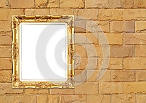 Blank golden frame on brick stone wall